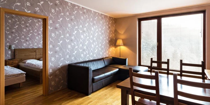 Apartmán Standard má 1 ložnici a obývací pokoj s kuchyňským koutem.