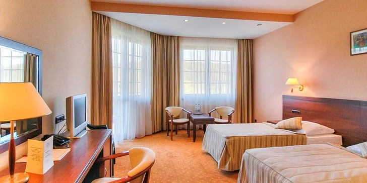 Za příplatek se můžete ubytovat v prostornějším pokoji Lux (30 m²). Typ pokoje si zvolíte při nákupu voucheru.