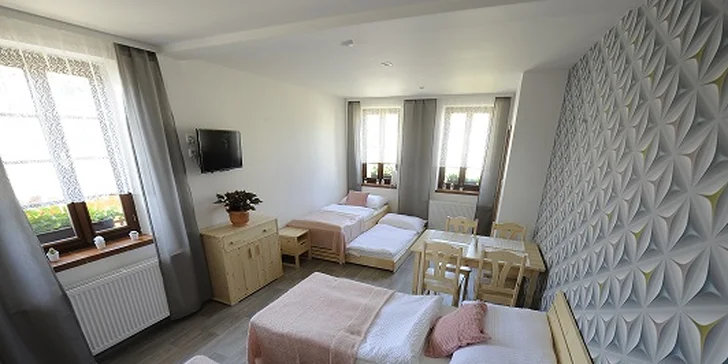Bydlet budete v moderním apartmánu hned vedle zámeckého parku.