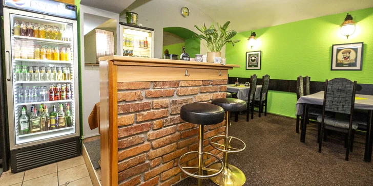 Restauraci najdete přímo u zastávky Dobrovského.