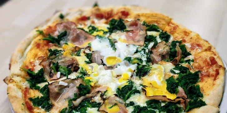 Kromě samotné dráhy a koulí tu na vás čeká i jedna nebo dvě pizzy dle vašeho výběru. 