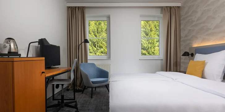 Ubytujete sa v OREA hoteli Špičák v izbe podľa výberu (Deluxe alebo Executive) s rozlohou 22–36 m².