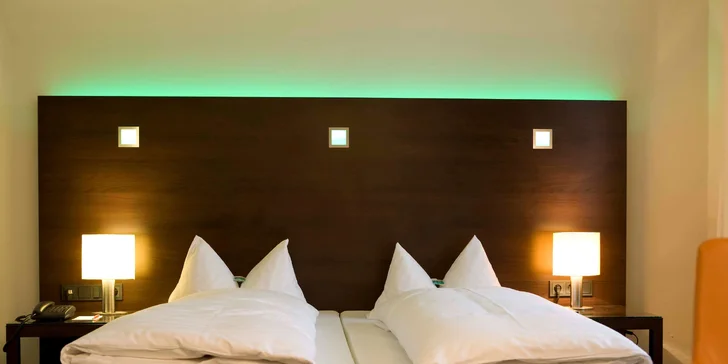 Izby majú TV, Wi-Fi, telefón, minibar aj klimatizáciu.