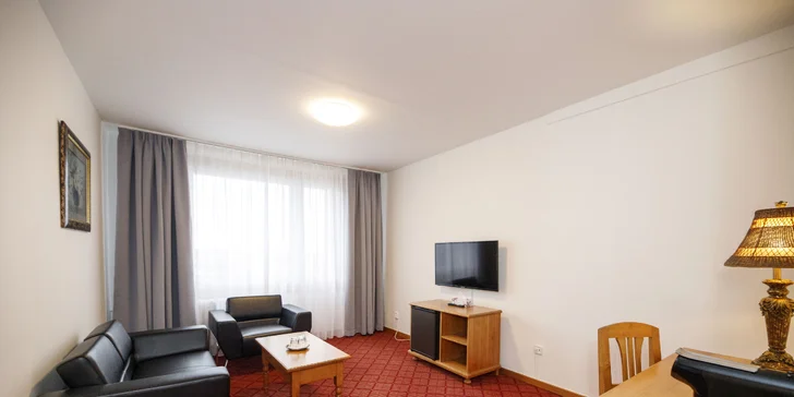 V pokojích deluxe je Smart TV a také kávovar.