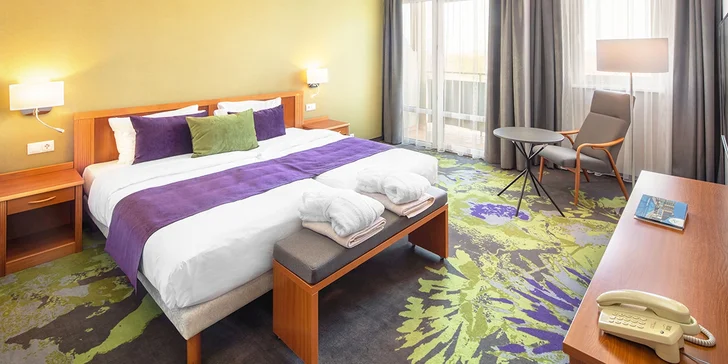 Zabydlíte se ve dvoulůžkovém pokoji Superior nebo apartmánu.
