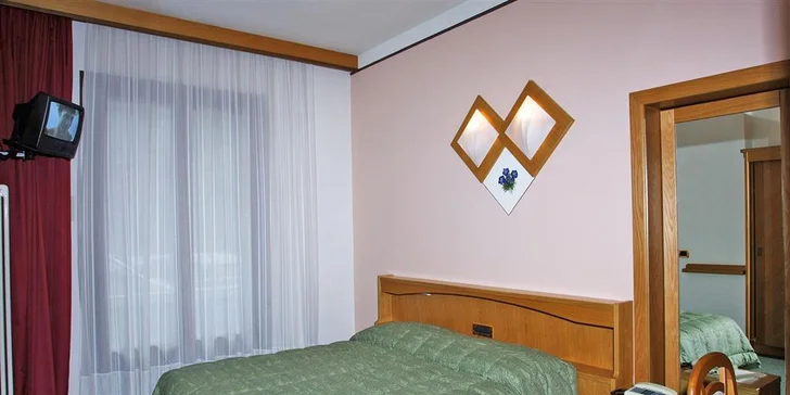 Italské Alpy jako na dlani: Lyžovačka s dopravou, 2 nocemi v hotelu a polopenzí
