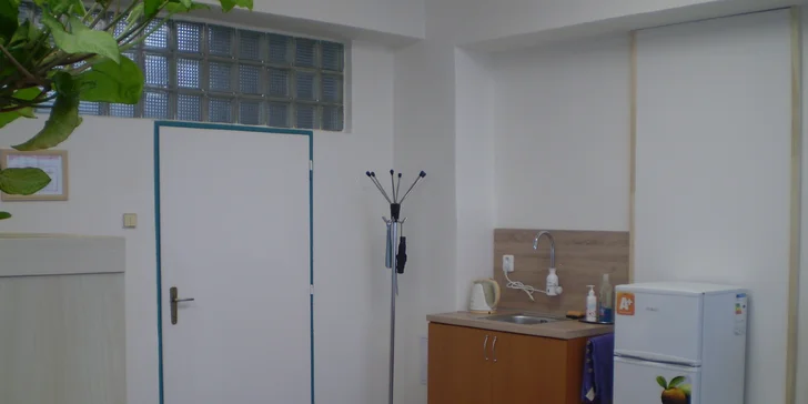 Relaxační masáž zad s vůní modrého irisu včetně zábalu