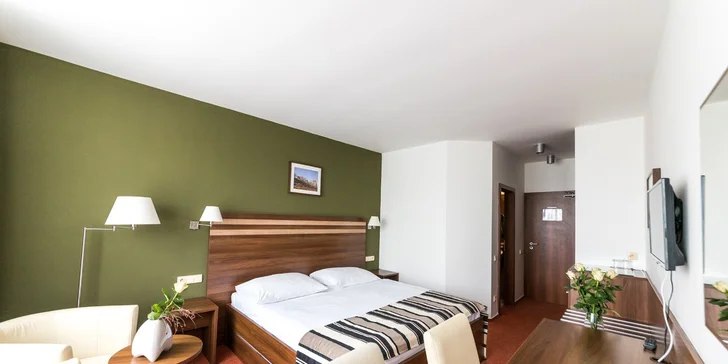 Zabydlíte se v elegantním pokoji Komfort.