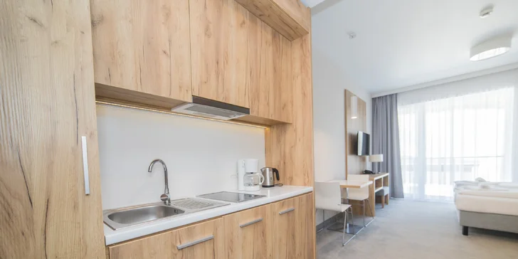 Každý apartmán má kuchyňku, sadu na přípravu kávy a čaje.