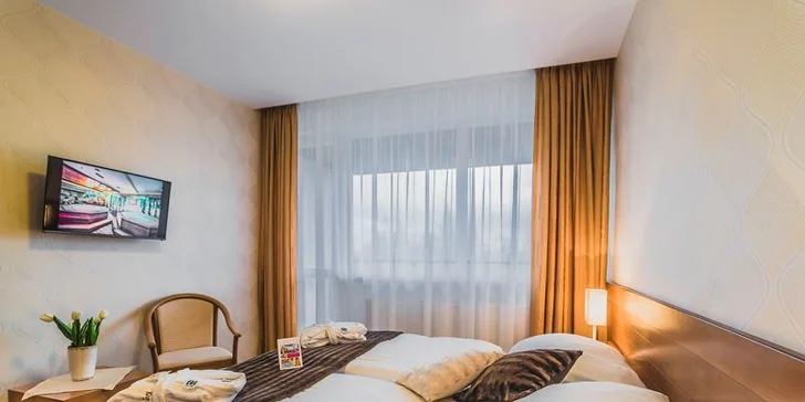 4* wellness pobyt v Tatrách: snídaně či polopenze, bazény i jacuzzi bar pro 2