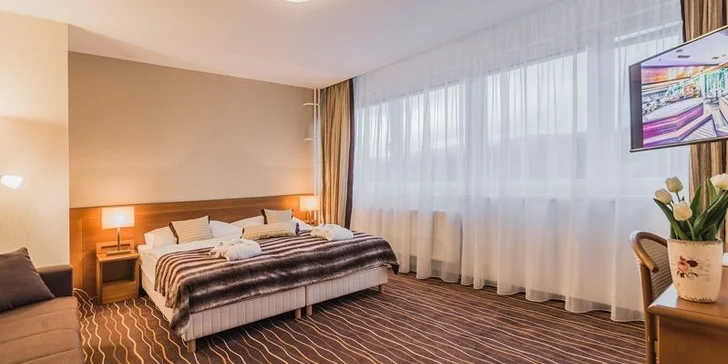 4* wellness pobyt v Tatrách: snídaně či polopenze, bazény i jacuzzi bar pro 2