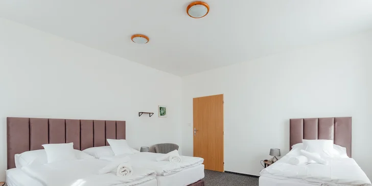 Trojlôžková izba v apartmáne.