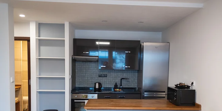 V každém apartmánu najdete plně vybavenou kuchyňskou linku.