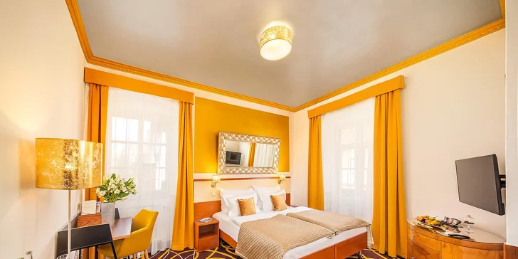 Deluxe nabízí dostatek prostoru i pro to, aby se sem vešel minibar. 