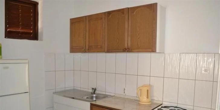 Takhle vypadá kuchyňka.