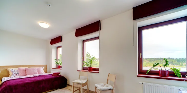 Větší dvoulůžkový pokoj Deluxe