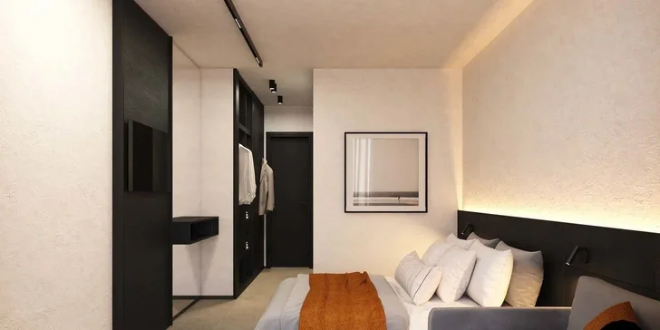 Pokoje se pyšní elegantním designem, světlými barvami, příjemným kobercem a atmosférou pro dokonalý odpočinek. 
