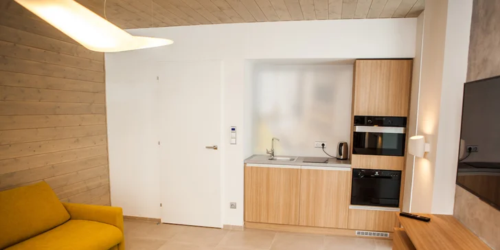 Součástí apartmánů je také kuchyňský kout. 