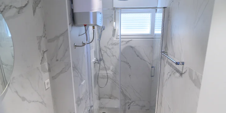 Kúpeľňa v apartmáne Deluxe