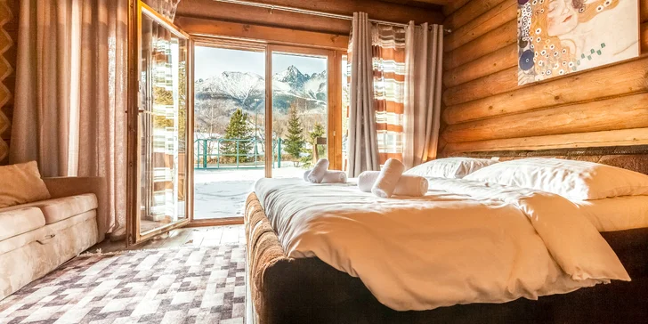 Čakajú vás komfortne zariadené izby a apartmány s panoramatickým výhľadom na Lomnické sedlo.