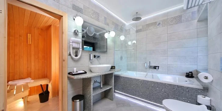 V koupelně je vířivá vana a finská sauna. To bude, panečku, relax!