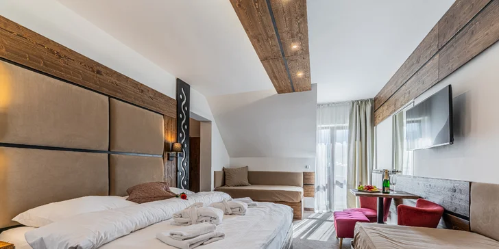 V pokojích a apartmánech můžete sledovat TV, připojíte se také na Wi‑Fi. 