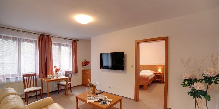 Pokud v apartmánu, připraví vám na pokoj i láhev vína. 
