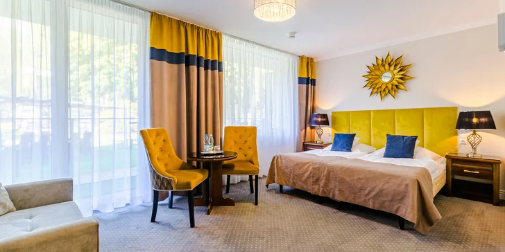 Bydlet budete v pokoji Comfort nebo prostornějším Deluxe.