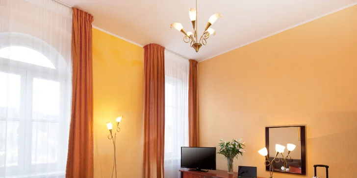 Pokoj Deluxe má navíc balkon.