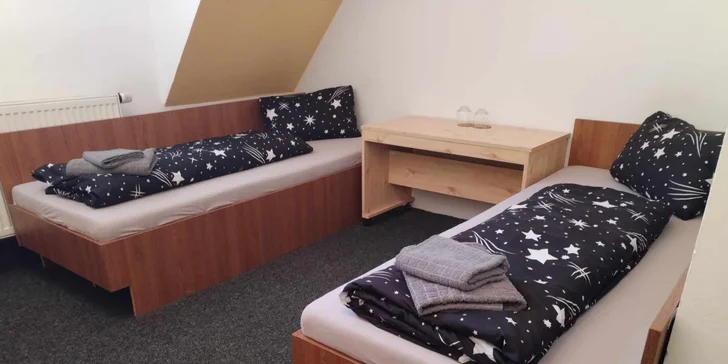 V pokoji vás budou čekat pohodlné postele a samozřejmě i vlastní koupelna.