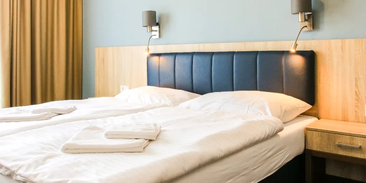 Vychutnajte si komfort v moderne zariadeným izbách alebo apartmánoch.