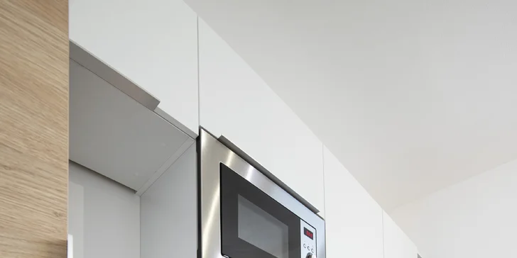 V kuchyni je kromě jiného kávovar Nespresso (rodinný apartmán se dvěma ložnicemi).