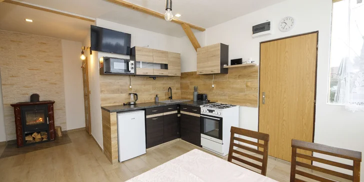  Připravený tu pro vás bude moderní apartmán až pro 5 osob – přímo z apartmánu uvidíte Lipno.