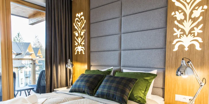 Manželská posteľ v apartmáne Sniezynka.