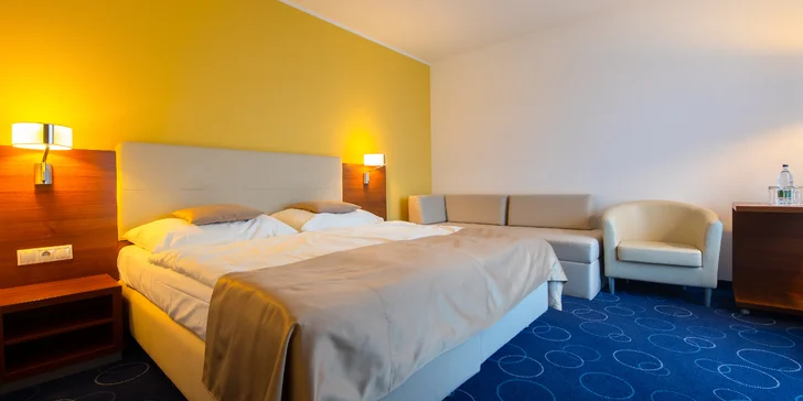Ubytovaní budete v modernej izbe typu Comfort s balkónom