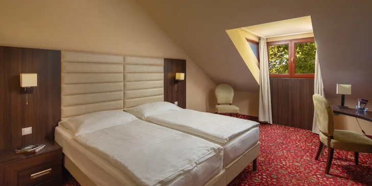 Design pokojů spojuje barokní a moderní styl a vytváří tak jedinečnou atmosféru.