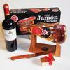 Dárkové balení šunky Jamón Curado (stojánek, nůž, pralinky, víno)