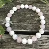 Šťastná duše – růženín a howlit – cca 18 cm