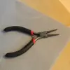 Ketlovací kleště s pracovní podložkou