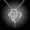 Romantický náhrdelník Dvojité srdce s krystaly