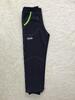 Softshellové kalhoty | Velikost: 80 | Černá se zeleným štepováním