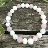 Šťastná duše – howlit/růženín (cca 18 cm)