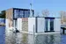 Houseboat XXL s motorovým člnom (132 m²)
