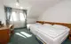 Třílůžkový pokoj (22 m²)