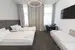 Trojlôžková izba v zníženom prízemí (22 m²)