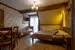 Trojlôžková izba Deluxe (21–26 m²)