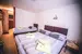 Třílůžkový pokoj část B** (18–22 m²)
