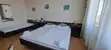 Třílůžkový pokoj (26 m²)
