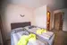 Dvoulůžkový pokoj část B** (18–22 m²)